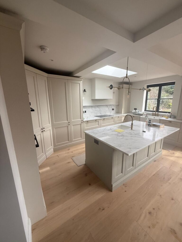 Bespoke kitchen with marble worktop and island, fitted by R3 Carpentry West London